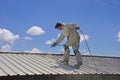 Painting the roof Royalty Free Stock Photo