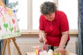 Painting Therapy with a mentally disabled woman Royalty Free Stock Photo