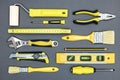 Painting tools for house renovation works. top view on gray background Royalty Free Stock Photo