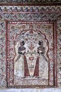 Painting of two woman painted on the wall of Raja Mahal Palace of Orchha