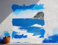 Painting the walls of the house with blue paint in the village. Image generated by artificial intelligence