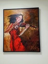 painting of a woman in a red dress playing the violin