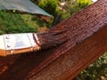 Painting wood on the roof close up