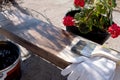 Painting a wooden board outdoors. Coated with protective oil against decay and moisture. Royalty Free Stock Photo