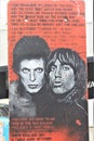 Painting on the Berlin wall - graffiti art with David Bowie and Iggy Pop Royalty Free Stock Photo
