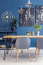 Paintings in blue dining room Royalty Free Stock Photo