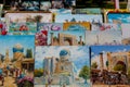 Paintings of Middle asia srchitecture sold on the street Royalty Free Stock Photo