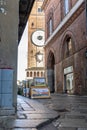 Paintings for Sale in Street and a view of the Torrazzo in Cremona located next to the Cathedral, Italy Royalty Free Stock Photo