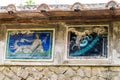 Paintings on a wall in Herculaneum, Italy