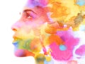 Paintography. Double exposure. Close up of an attractive model combined with colorful hand drawn ink and watercolor painting with Royalty Free Stock Photo