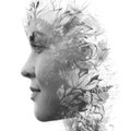 Paintography. Double exposure profile of a young natural beauty, with face and hair combined with hand drawn leaves dissolving