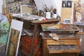 Paints and Canvases in Artist`s Studio