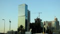 Paints evening Tel Aviv. Rays of sunset on the walls of the city.