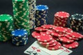 Pair of ace winner, poker chips stacked and pair of aces, black background Royalty Free Stock Photo