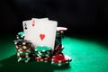 Casino chips stack and cards on gambling table. Winning concept. Royalty Free Stock Photo