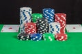 Pair aces and poker chips stack on green table Royalty Free Stock Photo