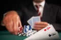 Pair of aces and poker player Royalty Free Stock Photo