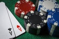 A pair of aces on the table with poker chips Royalty Free Stock Photo