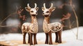 A pair of adorable reindeer figurines made of wood,