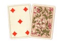 A pair of antique playing cards with the five of diamonds revealed.