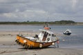 Pair of beached fishing boats in Carne, Ireland.