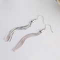 A pair of beautiful 925 sterling silver earrings in tassel shape isolated