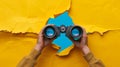 A pair of binoculars emerges through a torn yellow paper against a blue background.. AI generated Royalty Free Stock Photo