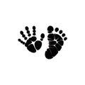 A pair of black handprint and footprint silhouettes Royalty Free Stock Photo