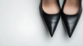 Pair of black high heels with a pointed toe Royalty Free Stock Photo