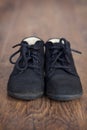 Pair of black lace-up toddler walking boots.