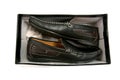 Pair of black male shoes in box isolated Royalty Free Stock Photo