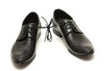 Pair of black man shoes tied together on white Royalty Free Stock Photo