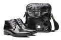 Pair of black men boots and messenger bag