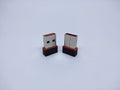 A pair of black and red bluetooth usb dongles on a white background Royalty Free Stock Photo