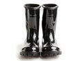 A pair of black rubber boots on a white background Royalty Free Stock Photo