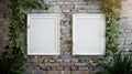 Pair of blank white frames displayed on brick wall mockup for elegant interior design Royalty Free Stock Photo