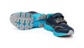 Pair of blue and black sporty shoes for kid on white Royalty Free Stock Photo