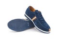 Pair of blue leisure shoes for man on white Royalty Free Stock Photo