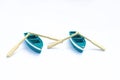 Pair of blue miniature boats with oars isolated with shadow on white background. two blue toy ships