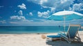 Pair of blue sun loungers and a beach umbrella on deserted beach perfect vacation concept Royalty Free Stock Photo