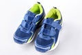 Pair of blue trainers on white background. Royalty Free Stock Photo