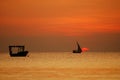 Pair of boats in sunset