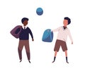 Pair of boys dressed in school uniform playing football. Students, pupils, classmates or schoolfellows kicking ball Royalty Free Stock Photo