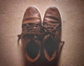 A pair of brown colour leather shoes of men concept of fashion and glamour
