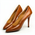 A pair of brown high heels on a white background Royalty Free Stock Photo