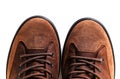 Pair of brown male boots isolated over white background Royalty Free Stock Photo