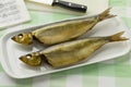 Pair of Buckling, hot smoked herring Royalty Free Stock Photo