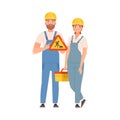 Man and woman builders in blue overalls. Vector illustration.