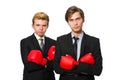 Pair of businessmen boxing on white