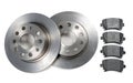Pair of car brake discs and pads on white background